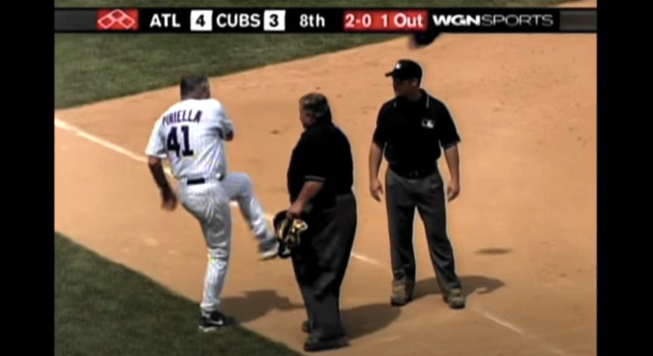 Chicago Cubs manager Lou Piniella reacts after umpire's call on a double  play that ended the Cubs second inning against the Colorado Rockies at  Coors Field in Denver on August 9, 2009.