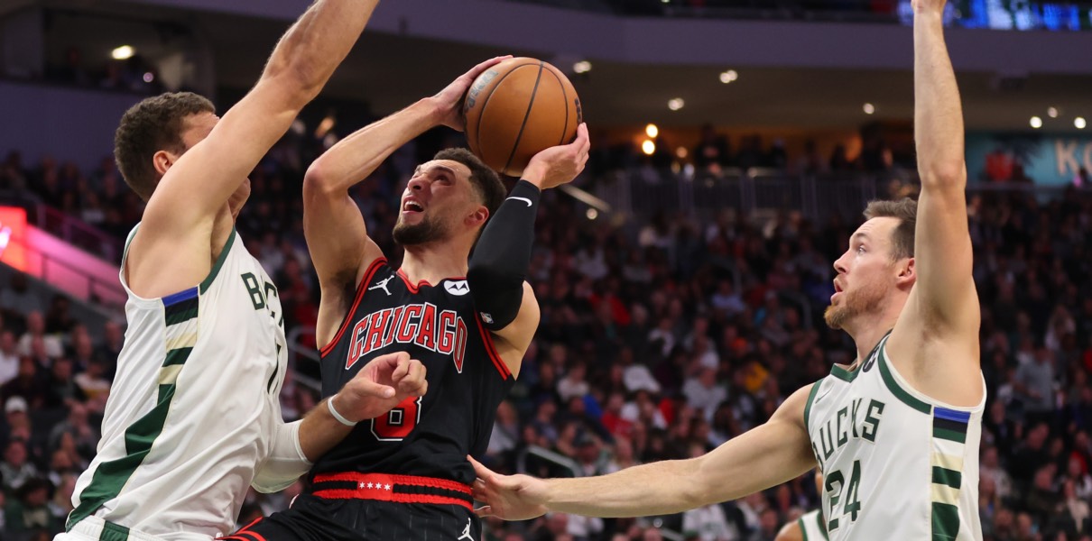 Zach LaVine of the Chicago Bulls drives into a crowd against the Milwaukee Bucks.