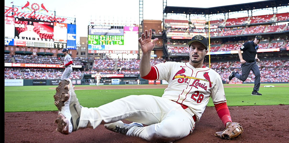 May 18, 2024;  St. Louis, Missouri, USA;  St. Louis Cardinals third baseman Nolan Arenado (28) slips and catches a foul ball in the fifth inning against the Boston Red Sox at Busch Stadium.  Mandatory Credit: Jeff Curry-USA TODAY Sports