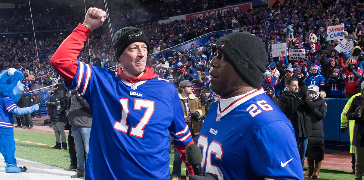Jan 15, 2022; Orchard Park, New York, USA; NFL Hall of Fame members and former Buffalo Bills players Jim Kelly (left) and Thurman Thomas prepare to get the crowd fired up   before an AFC Wild Card playoff football game against the New England Patriots at Highmark Stadium. Mandatory Credit: Mark Konezny-USA TODAY Sports