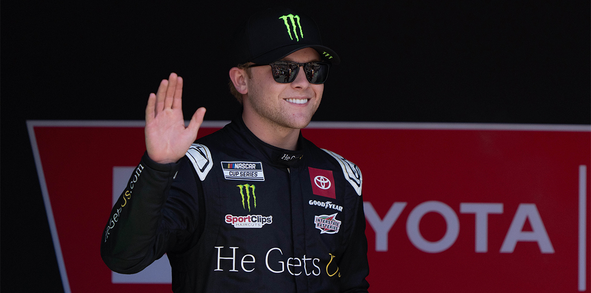 Jun 9, 2024; Sonoma, California, USA;  NASCAR Cup Series driver Ty Gibbs (54) waves as he gets introduced to fans before the start of the Toyota / Save Mart 350 at Sonoma Raceway. Mandatory Credit: Stan Szeto-USA TODAY Sports