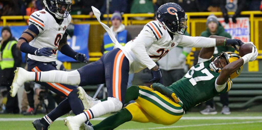 Chicago Bears cornerback Tyrique Stevenson (29) breaks up a potential touchdown reception against Green Bay Packers wide receiver Romeo Doubs (87) in the first half during their football game Sunday, January 7, 2024, in Green Bay, Wisconsin.