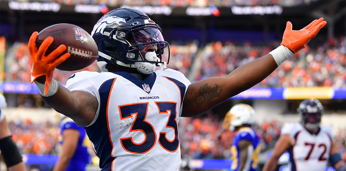 Dec 10, 2023; Inglewood, California, USA;  Denver Broncos running back Javonte Williams (33) celebrates his touchdown scored against the against the Los Angeles Chargers during the first half at SoFi Stadium. Mandatory Credit: Gary A. Vasquez-USA TODAY Sports